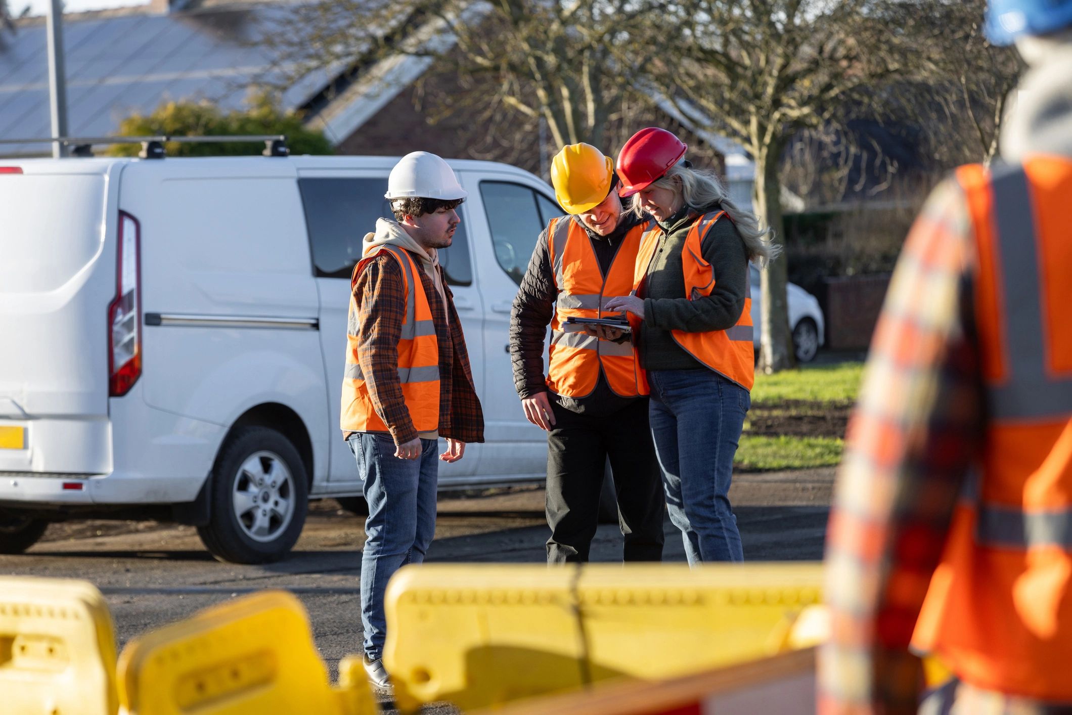 Construction professionals discussing project details