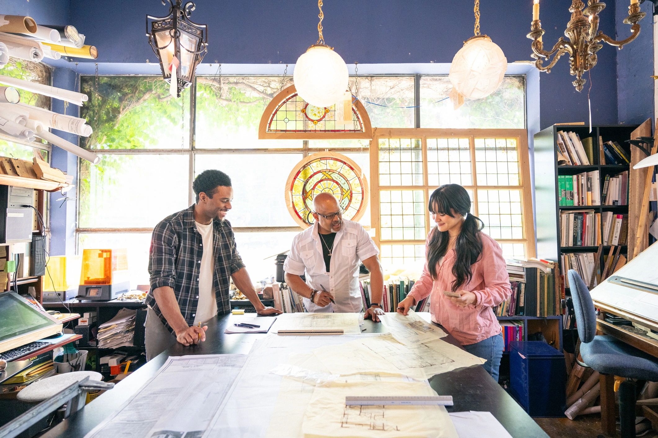 Architects collaborating on renovation project plans