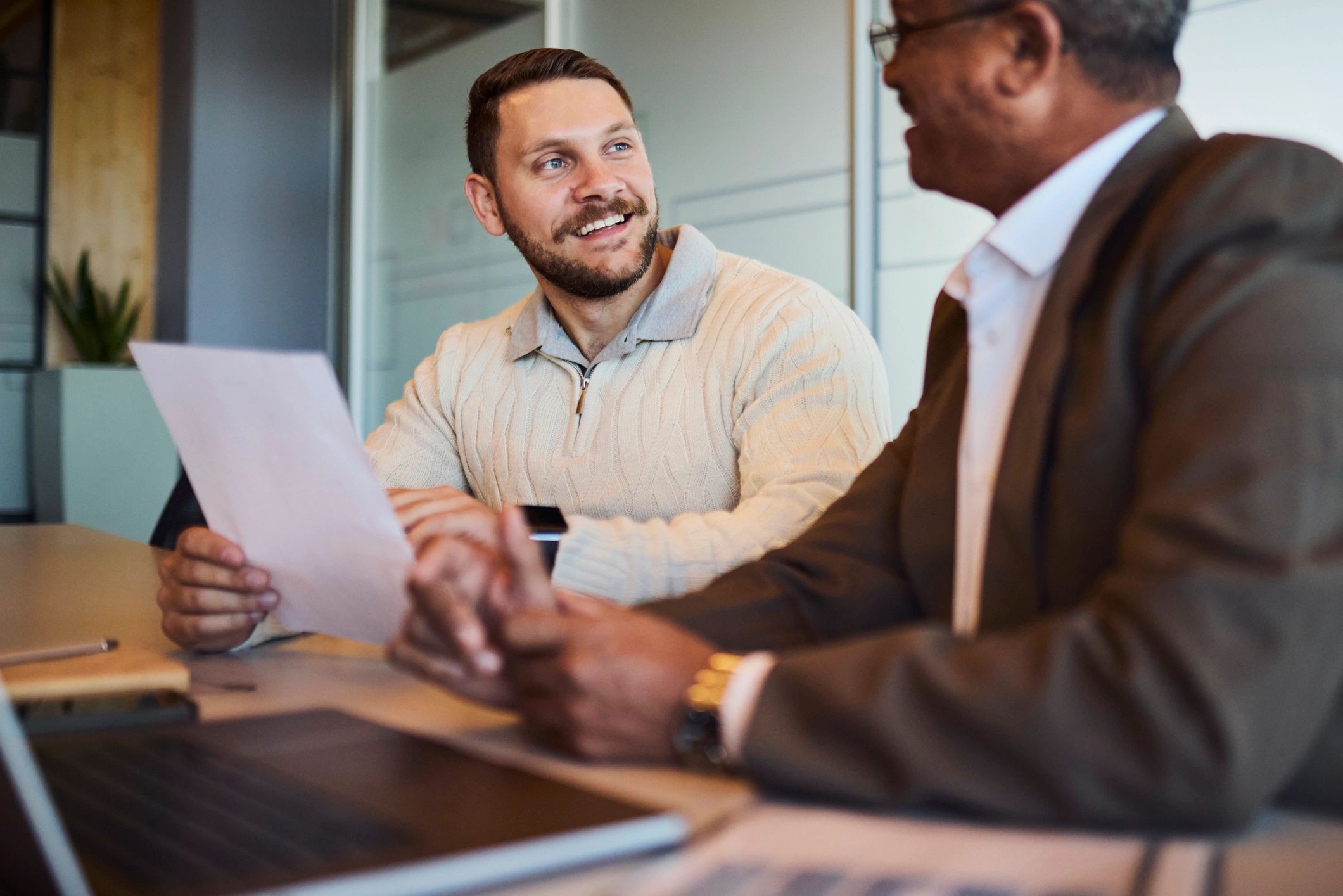 Business insurance consultation at a desk